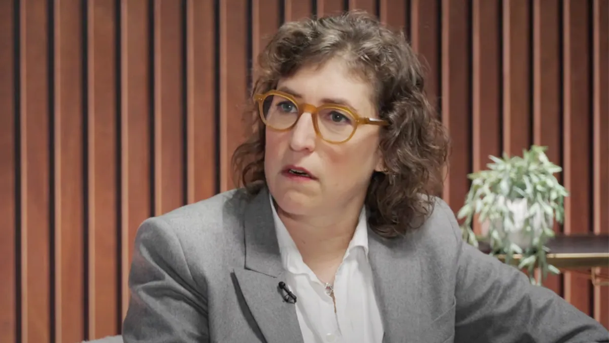 Mayim Bialik smiling in a screenshot from Club Random Media