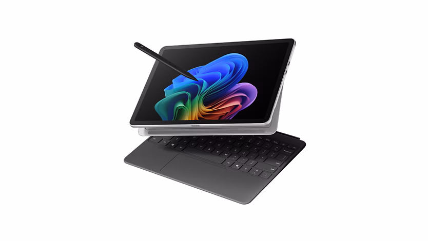 Surface Pro Copilot plus PC in platinum with slate keyboard.