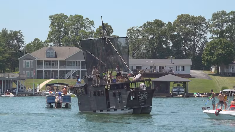 A pirate-themed boat floats on Smith Mountain Lake at Crazy Horse Marina