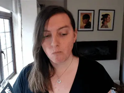 gif of me, i'm moving my mouth in a funny way and i look into the camera