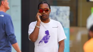 Image may contain Clothing Apparel Human Person Sunglasses Accessories Accessory AAP Rocky Sleeve and TShirt