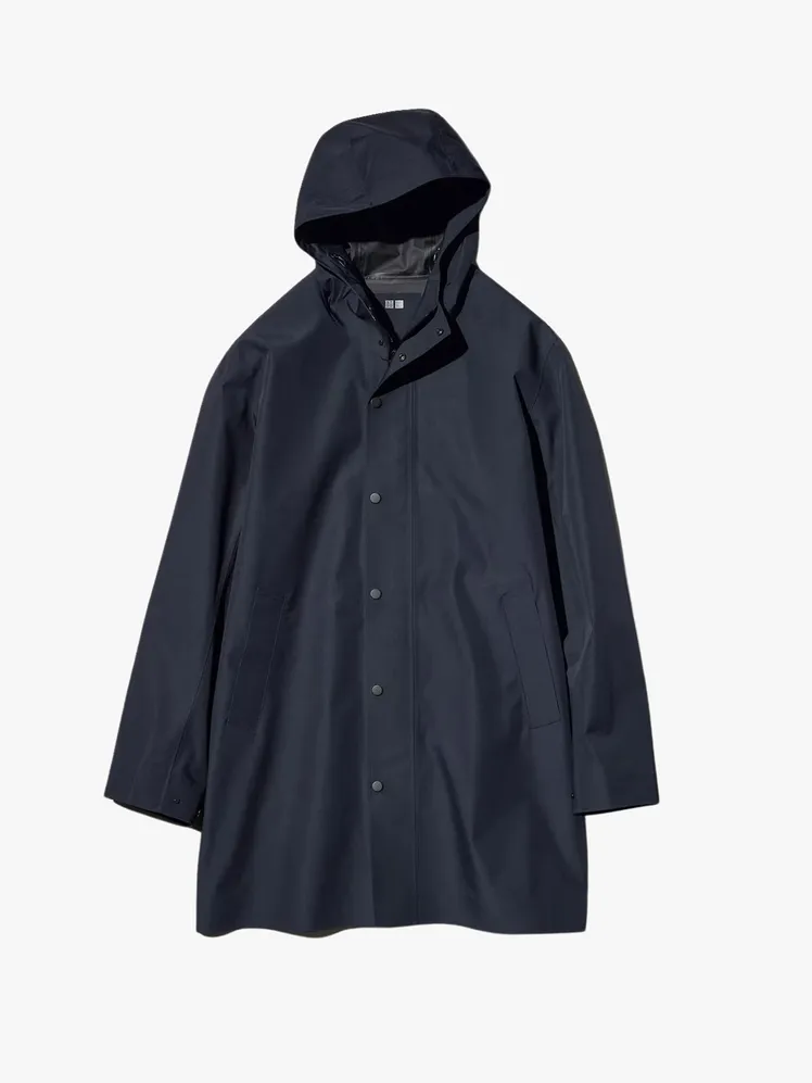 Image may contain Clothing Coat and Raincoat