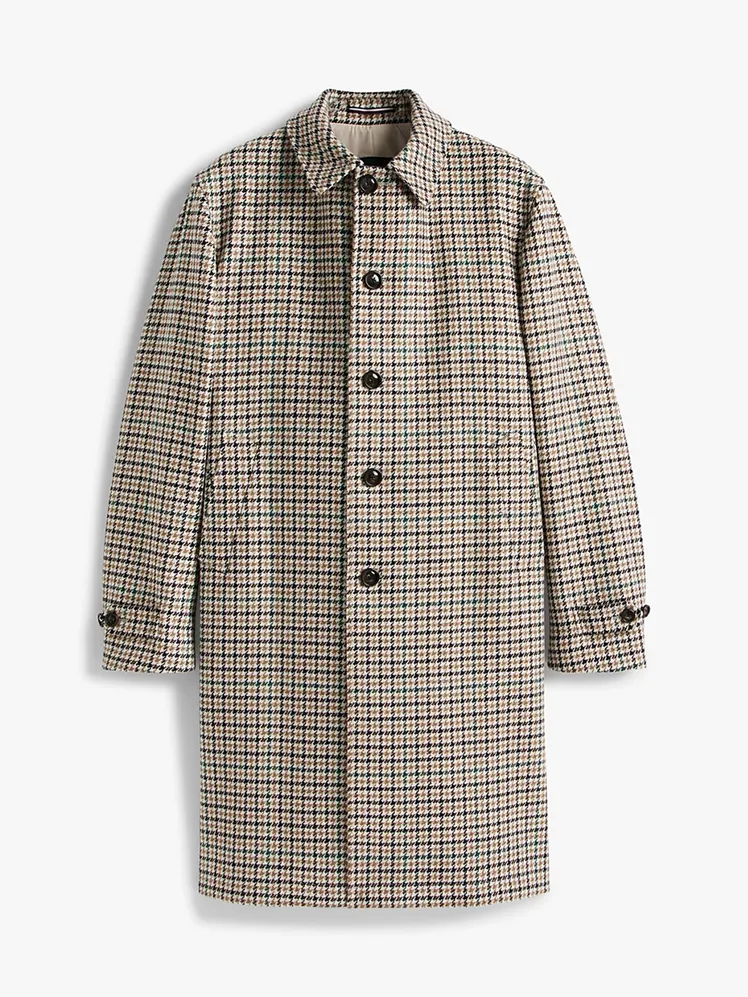 Image may contain Clothing Coat Shirt Long Sleeve Sleeve and Overcoat