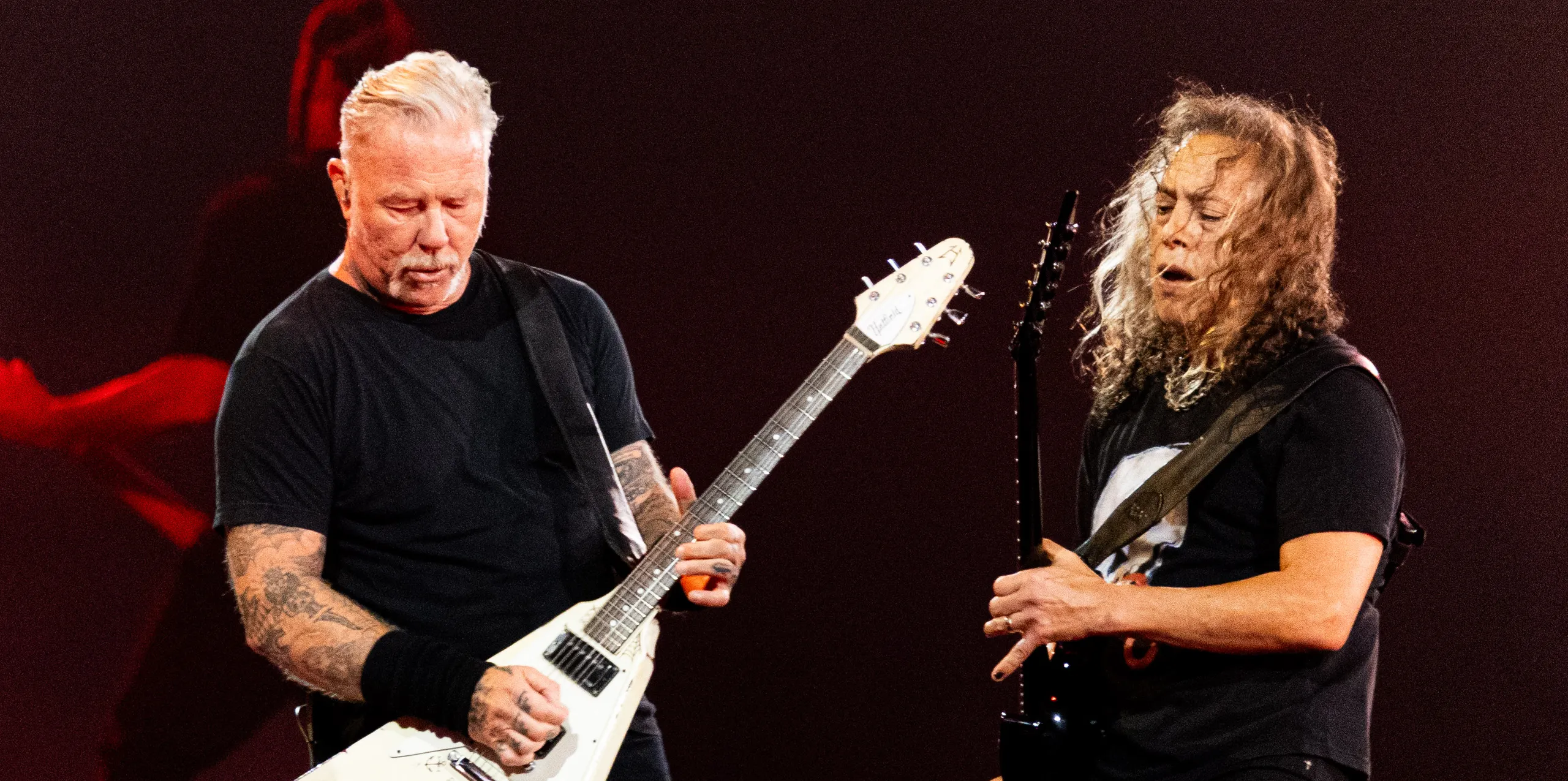 Image may contain James Hetfield Guitar Musical Instrument Adult Person Guitarist Leisure Activities and Music