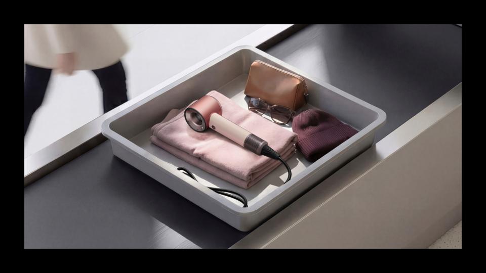 The Dyson Supersonic Travel Hair Dryer in Pink/Rose Gold.