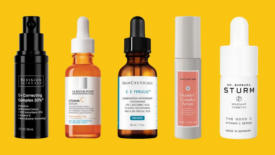 Five vitamin C serums on a yellow background