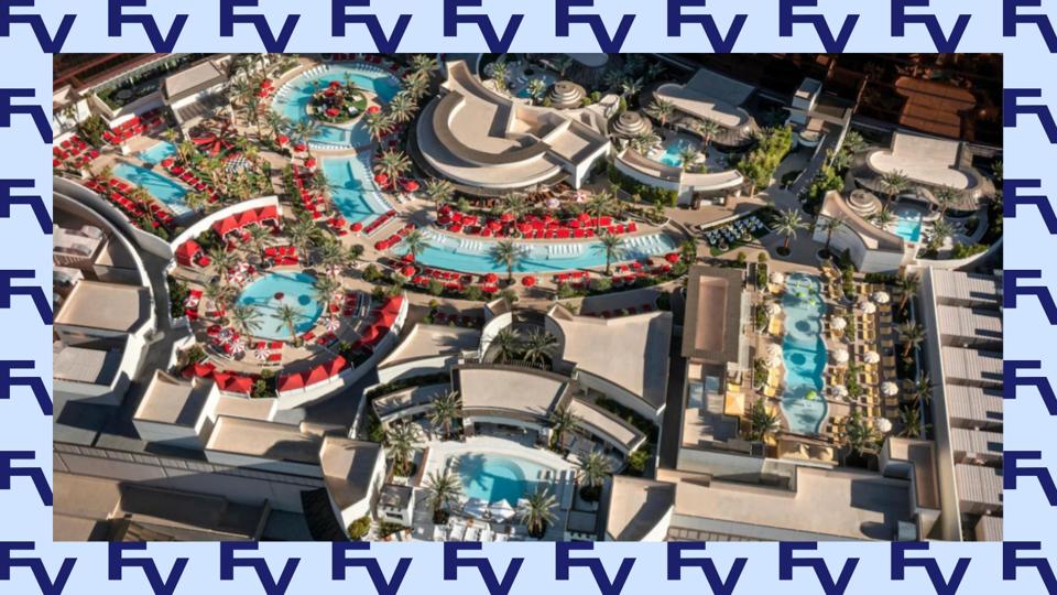 A bird's eye view of the Conrad in Las Vegas, with a Forbes Vetted border.