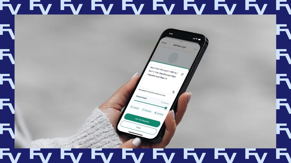 A person using ExpressVPN on their phone with a Forbes Vetted border.